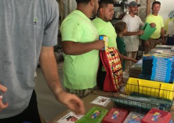 painting company collecting school supplies for students