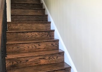 dark finished wooden stairway