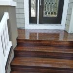 freshly stained front porch